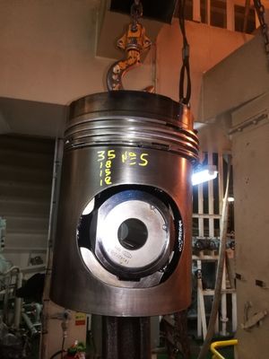 MAN 23/30 Cylinder piston repair